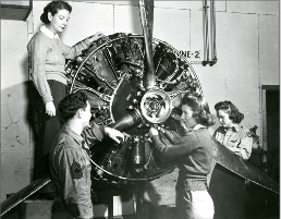 WASP examining an engine a Lockbourne Army Air Base in Columbus Ohio. Women Pilots, just like their male counterparts had to have a comprehensive understanding of the systems on an aircraft – understanding how an engine was designed to work could save their lives in an emergency.